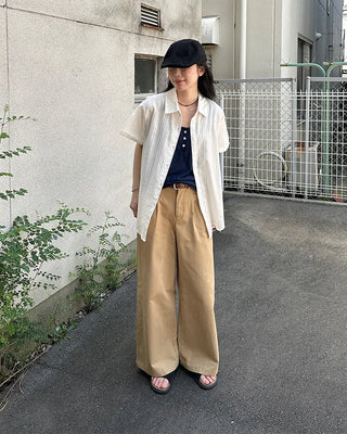 Button-point sleeveless top