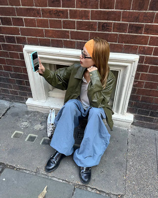 Black button-up elastic waist parachute pants