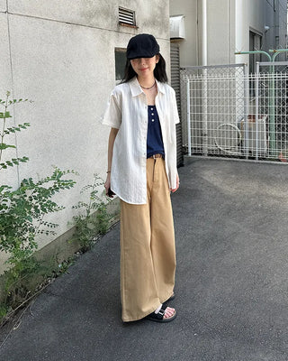 Button-point sleeveless top