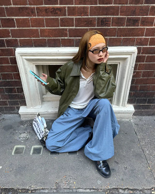 Black button-up elastic waist parachute pants