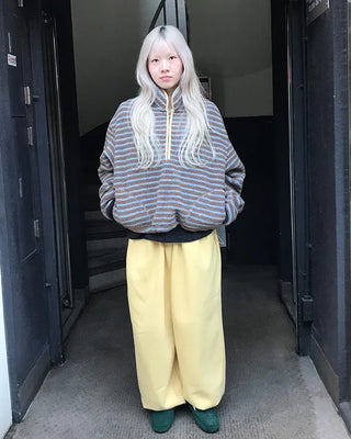 Fleece-lined one-pleat sweatpants