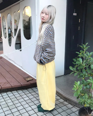 Fleece-lined one-pleat sweatpants