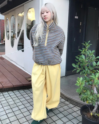 Fleece-lined one-pleat sweatpants