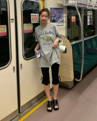 Pigmented floral print loose half-length T-shirt