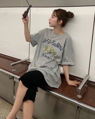 Pigmented floral print loose half-length T-shirt