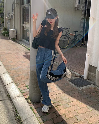 Triple side-stripe cutoff denim pants