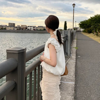 Back ribbon shirred blouse