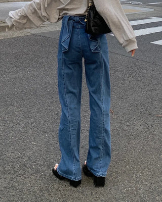 Back ribbon flared denim pants