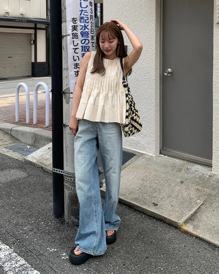 Pleated sleeveless blouse
