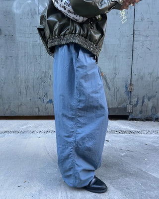 Black button-up elastic waist parachute pants