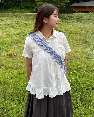 Striped half-moon shirred bag
