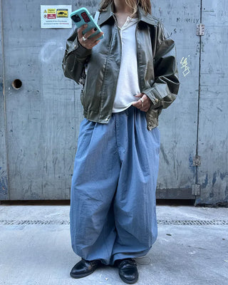 Black button-up elastic waist parachute pants