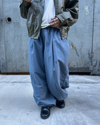 Black button-up elastic waist parachute pants