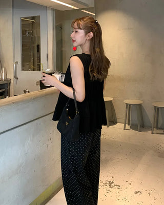 Pleated sleeveless blouse