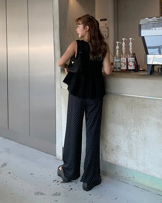 Pleated sleeveless blouse