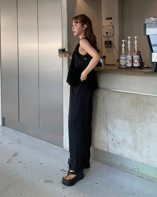 Pleated sleeveless blouse