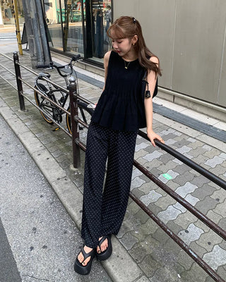 Pleated sleeveless blouse