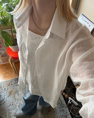 Round hem sheer loose shirt
