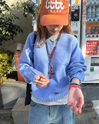 V-neck stitched raglan knit sweater