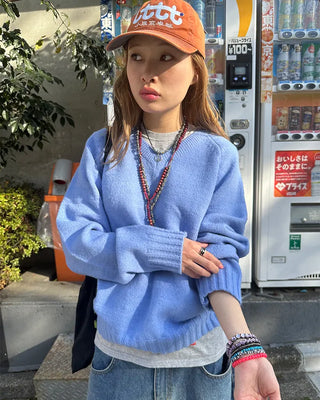V-neck stitched raglan knit sweater