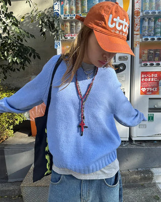 V-neck stitched raglan knit sweater