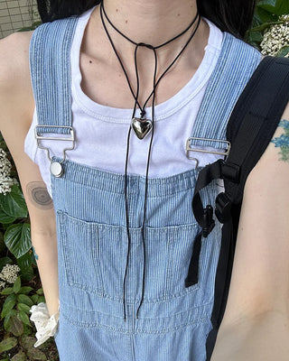 Heart pendant black strap necklace