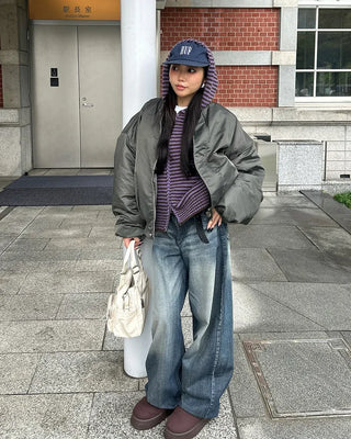 Seam-stitched distressed wide-leg denim pants