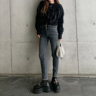 Double-button skinny pants