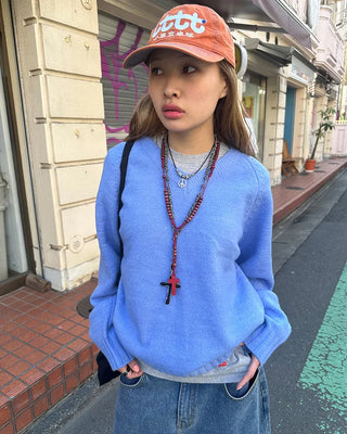 V-neck stitched raglan knit sweater