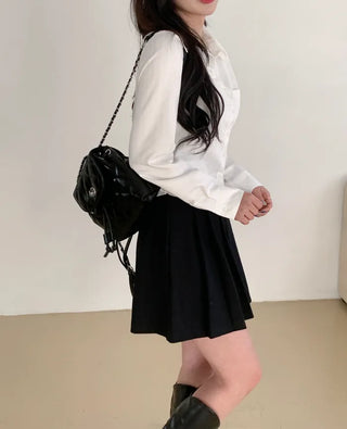 Chain quilted mini backpack