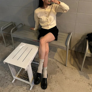 Gold heart button cable cardigan