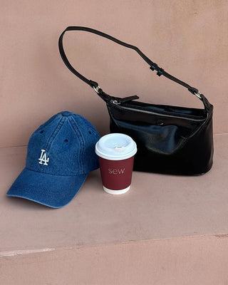 Round enamel shoulder bag