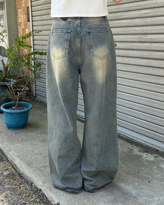Vintage distressed denim pants