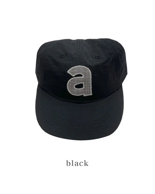 Dot Alphabet Cap