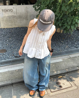 Pintuck frill sleeveless flared button blouse
