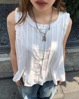 Pintuck frill sleeveless flared button blouse