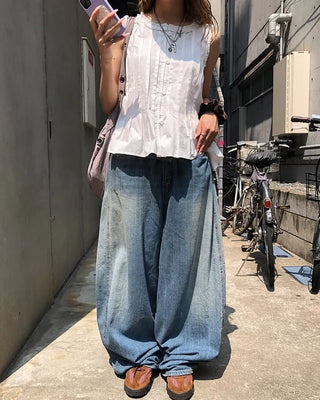 Pintuck frill sleeveless flared button blouse