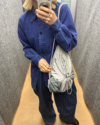 Drawstring net pocket backpack