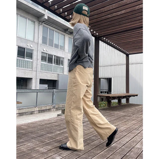 Brushed-back cotton pleated pants