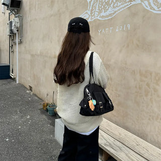 Two-pocket buckle shoulder bag