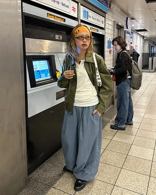Black button-up elastic waist parachute pants