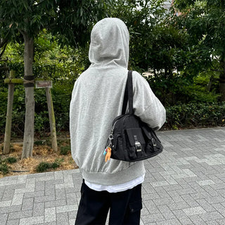 Two-pocket buckle shoulder bag