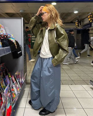 Black button-up elastic waist parachute pants