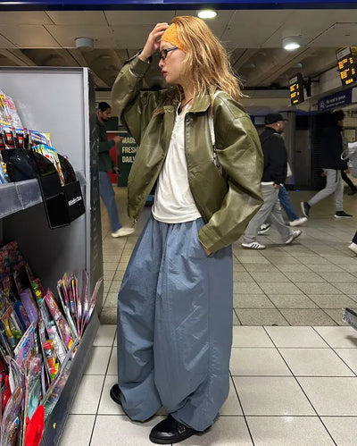 Black button-up elastic waist parachute pants