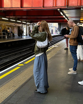 Black button-up elastic waist parachute pants