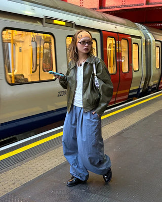 Black button-up elastic waist parachute pants
