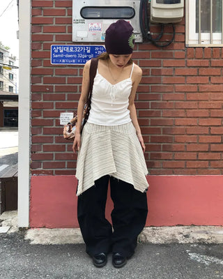 Unique strap cut-off midi skirt
