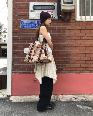 Unique strap cut-off midi skirt