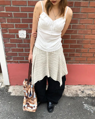 Unique strap cut-off midi skirt