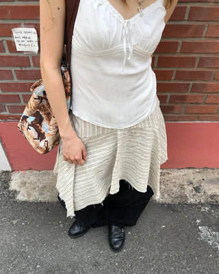 Unique strap cut-off midi skirt